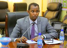 Image may contain: 1 person, sitting and indoor